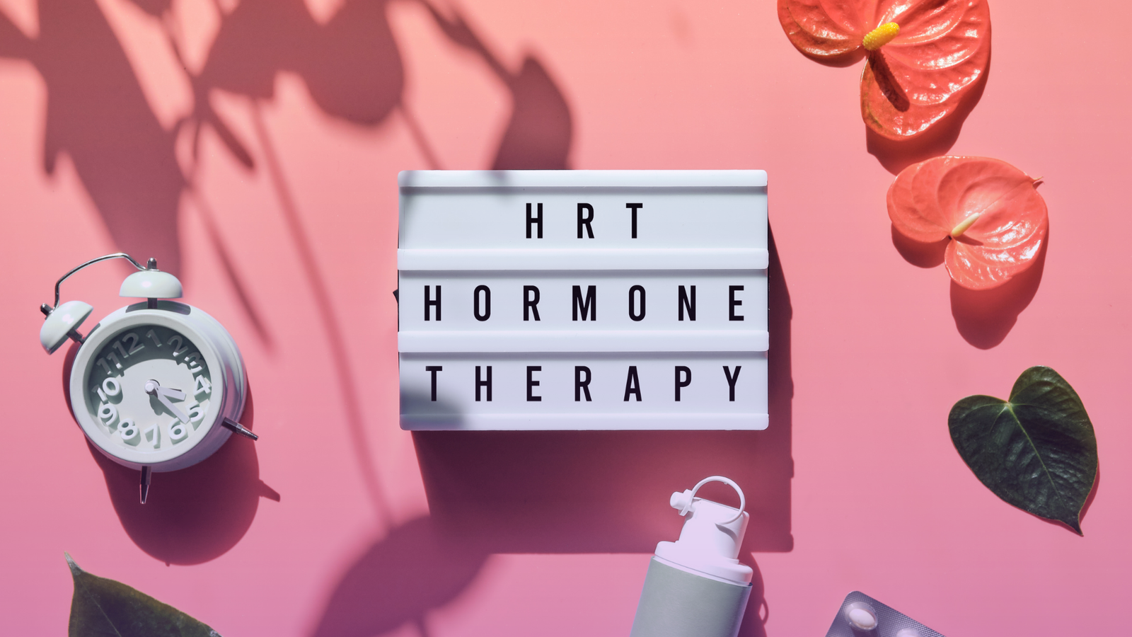 Lightbox showing “HRT hormone therapy” on a pink background, used for an article on the four approved indications for hormone replacement therapy
